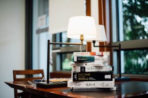 A stack of empowering books for women.