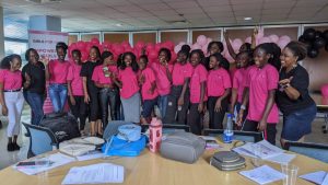A group of women sharing stories in a supportive environment.