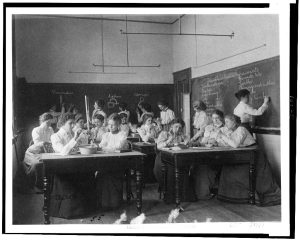 A group of young women participating in an educational workshop.