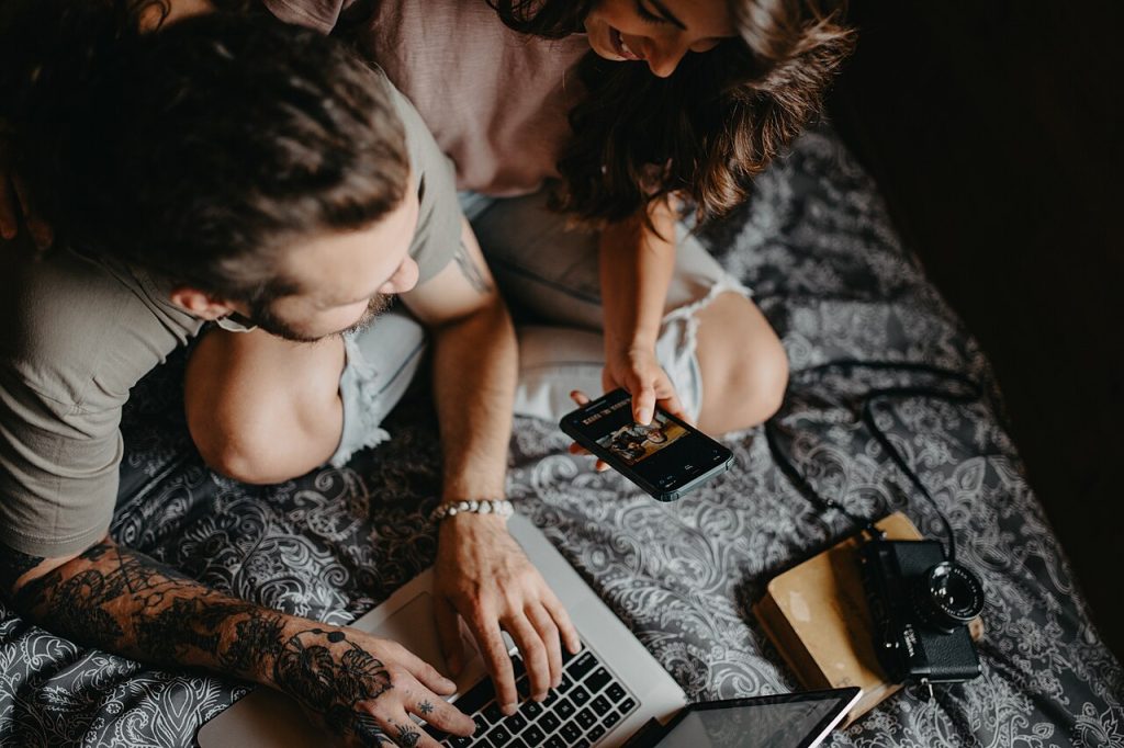 A couple communicating through digital devices